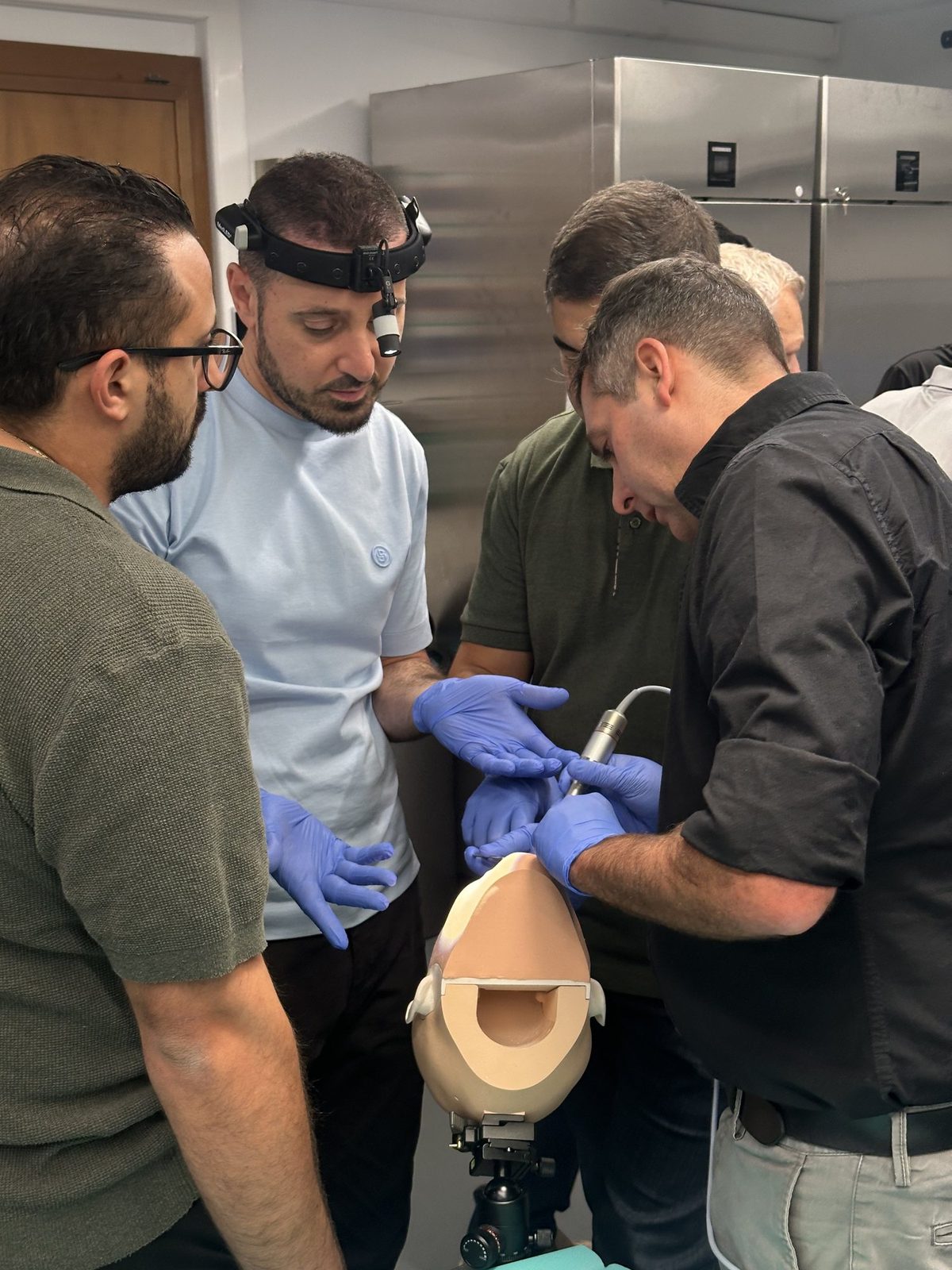 Hands-on work on a phantom model in the lab