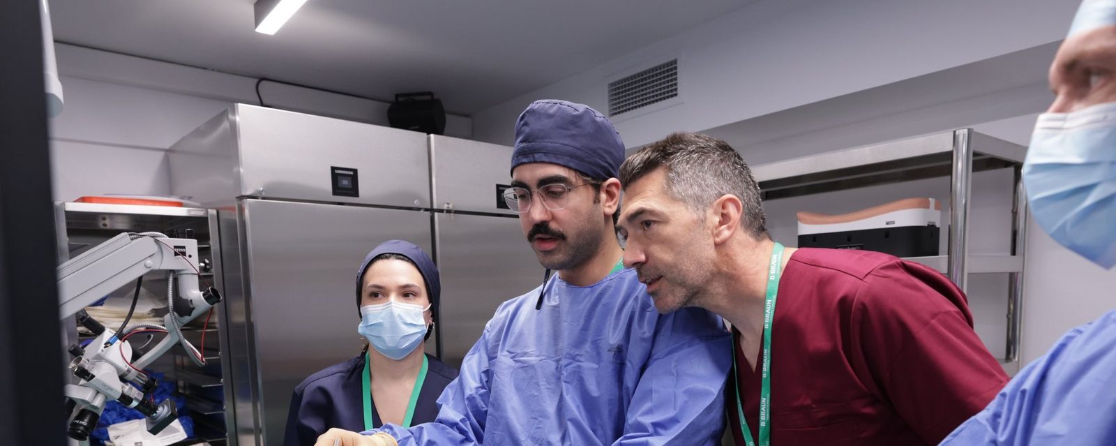 Instructor and participants at a dissection station